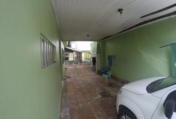 Casa sobrado no bairro Petrópolis de 4 dormitórios