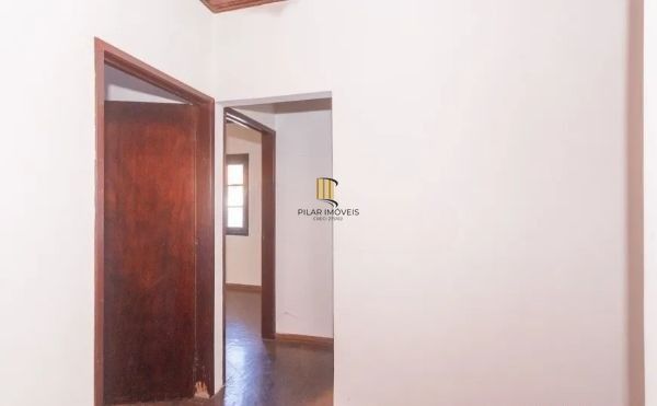 Casa no bairro Jardim Botânico de 4 dormitórios e 3 vagas