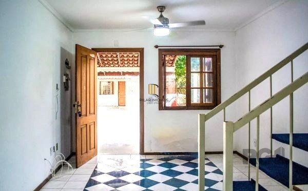 Casa em condominio no bairro Tristeza de 3 dormitórios e vaga