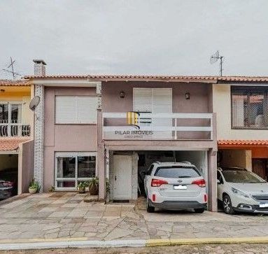 Casa em condomínio no bairro Santo Antômnio de 4 dormitórios e 2 vagas