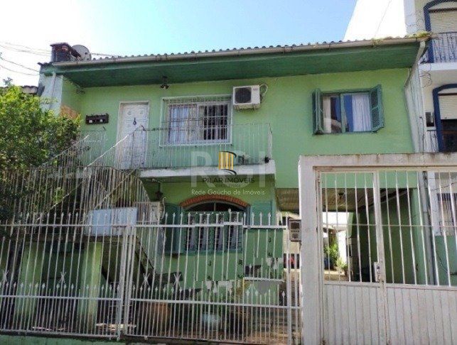 Casa sobrado no bairro Petrópolis de 4 dormitórios - Pilar Imóveis