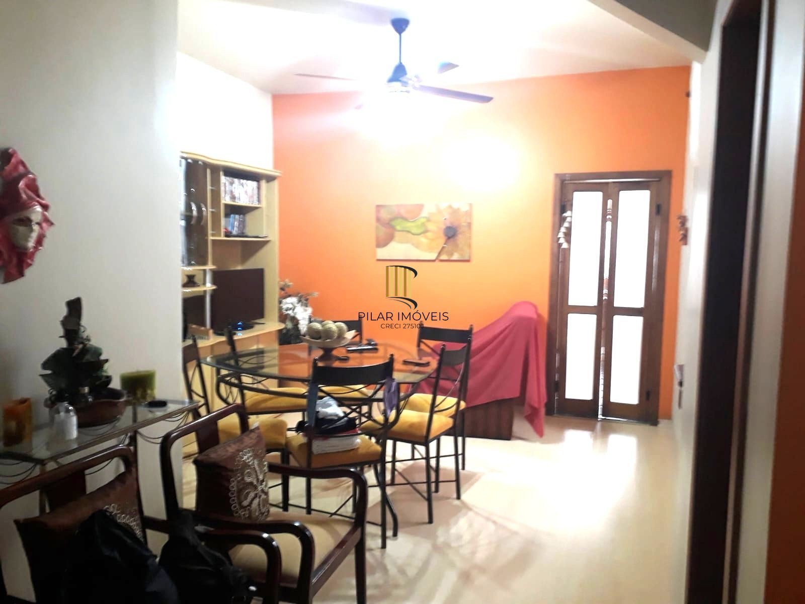 Casa sobrado no bairro Auxiliadora de 3 dormitórios e 3 vagas