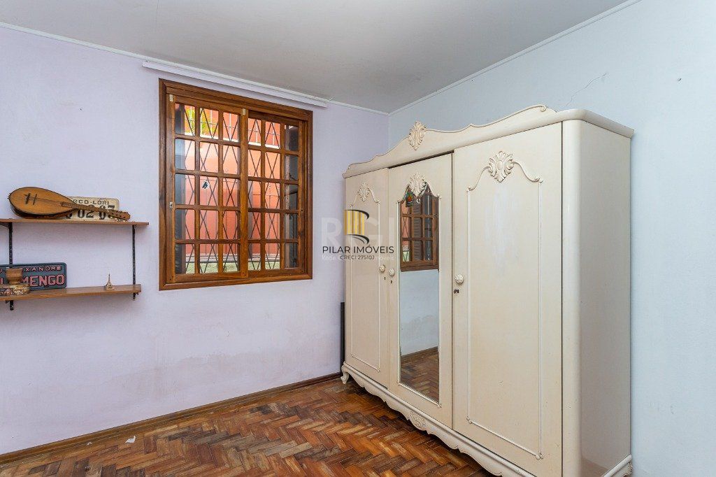 Casa sobrado no Jardim Botânico de 5 dormitórios e 2 vagas