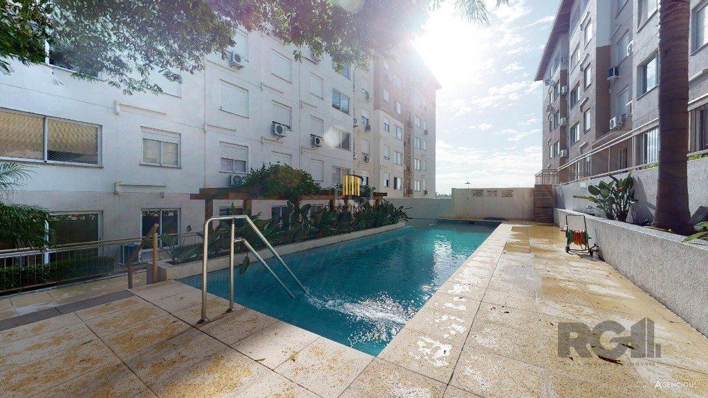 Apartamento no Urbano Menino Deus de 1 dormitório vaga e pátio