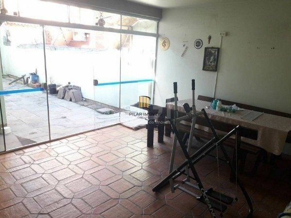 Casa no bairro Jardim Botânico de 3 dormitórios