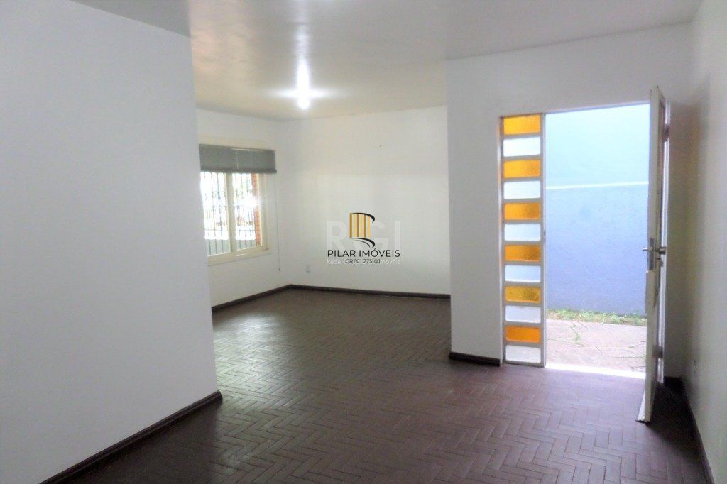 Casa no bairro Jardim Botânico de 3 dormitórios e 2 vagas