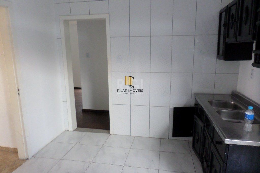 Casa no bairro Jardim Botânico de 3 dormitórios e 2 vagas