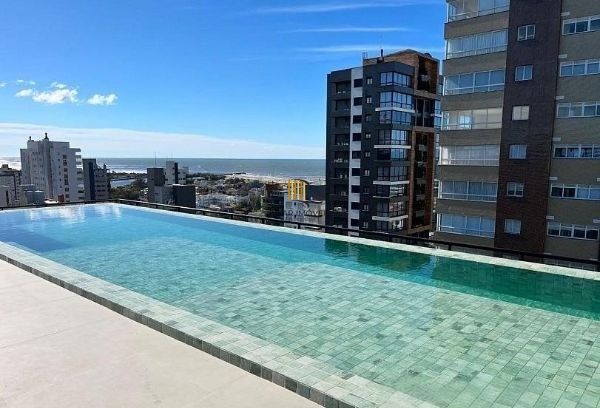 Apartamento em Torres Alto padrão de 3 dormitórios e 2 vagas