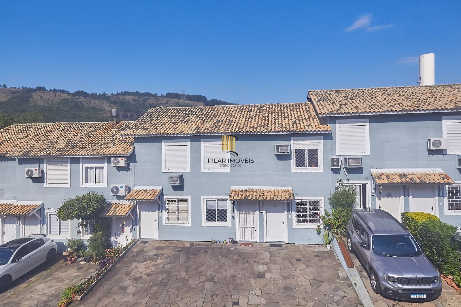 Casa sobrado em condomínio fechado no Alto Petrópolis de 2 dormitórios e vaga