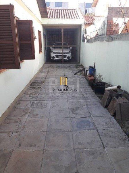 Casa no bairro Jardim Botânico de 3 dormitórios