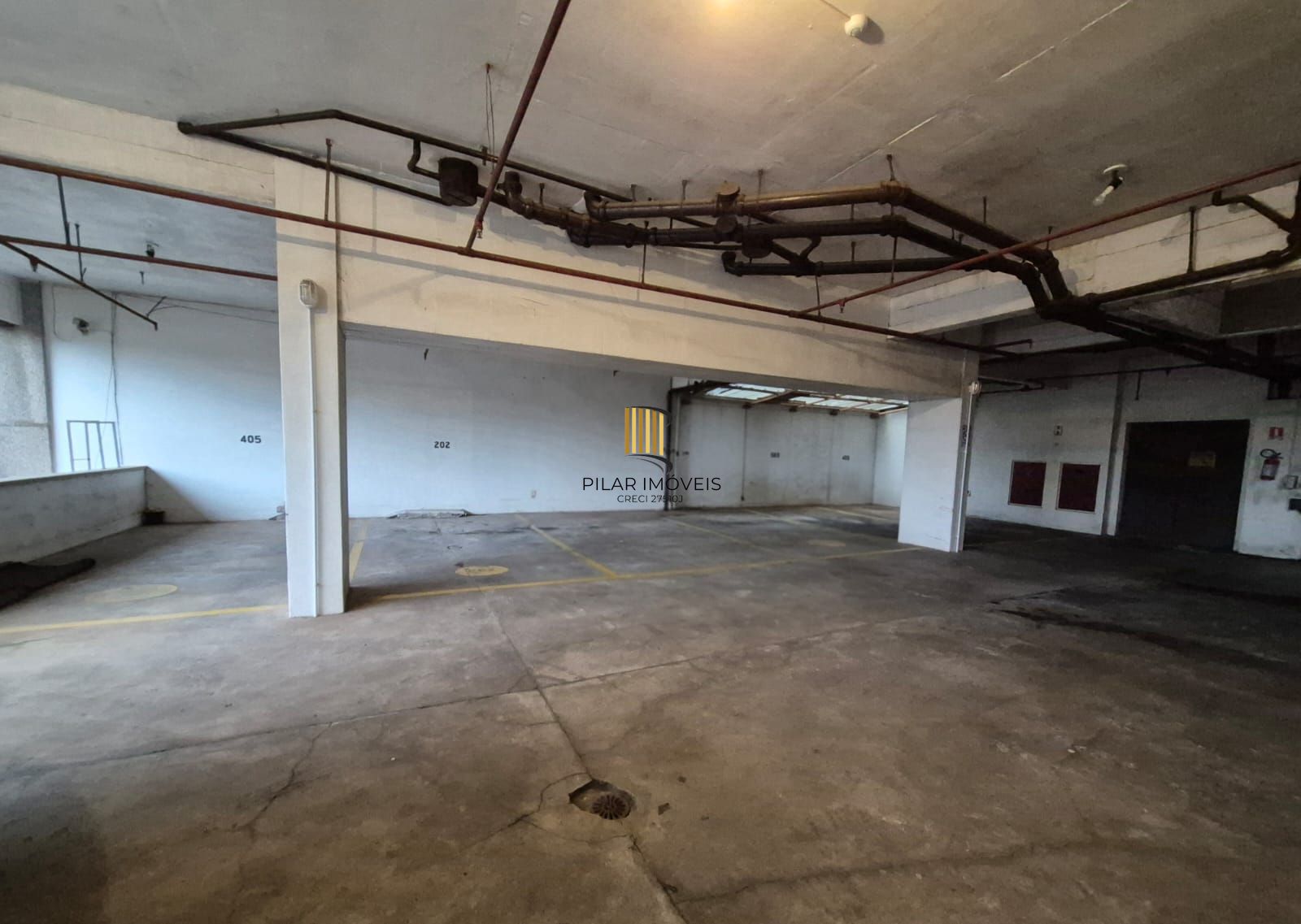 Sala comercial com vaga de garagem