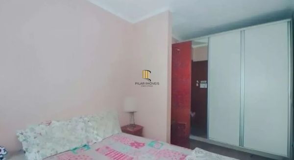 Casa sobrado no bairro Vila Ipiranga de 4 dormitórios e 2 vagas