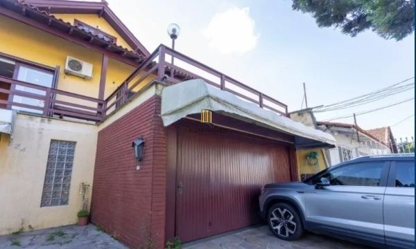 Casa sobrado no bairro Sarandi de 3 dormitórios e 2 vagas