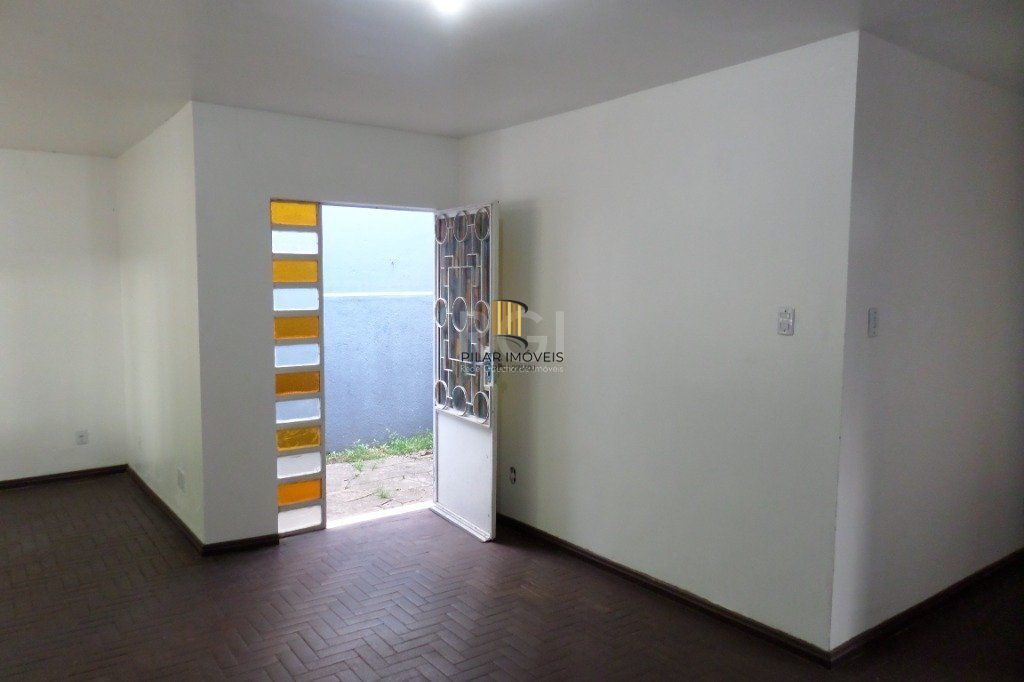 Casa no bairro Jardim Botânico de 3 dormitórios e 2 vagas