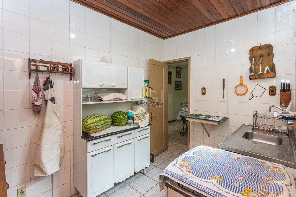 Casa sobrado no Jardim Botânico de 5 dormitórios e 2 vagas