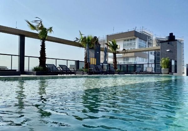 Apartamento em Torres Alto padrão de 3 dormitórios e 2 vagas