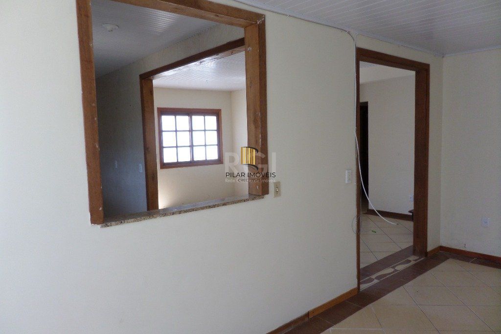 Casa na Hípica com 3 dormitórios e 2 vagas