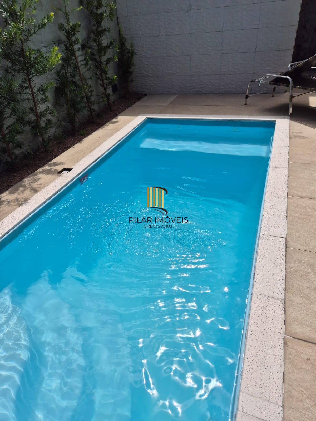 Sobrado no Menino Deus de 3 dormitórios e vaga