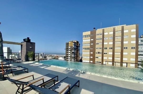 Apartamento em Torres Alto padrão de 3 dormitórios e 2 vagas