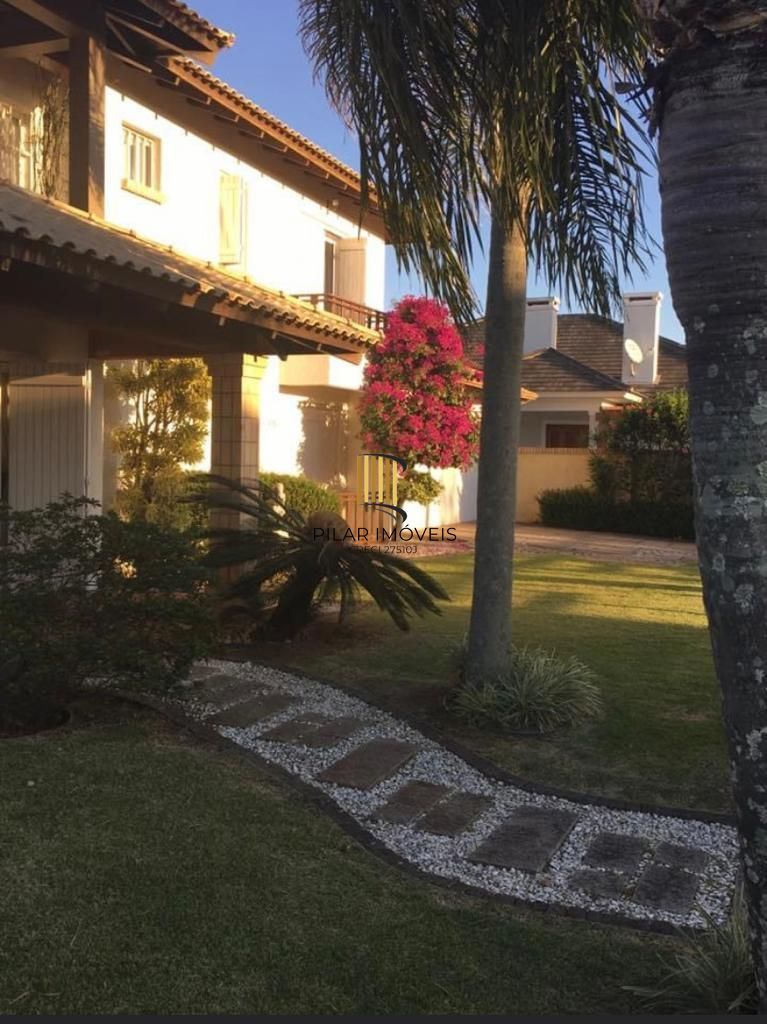 Casa na praia de Atlântida de 4 dormitórios