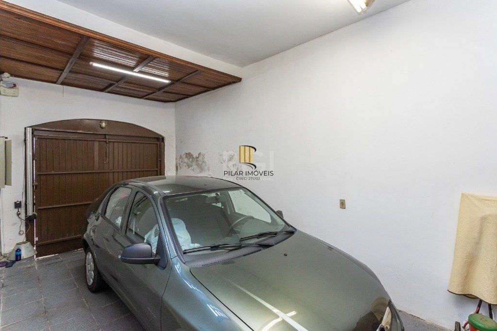 Casa sobrado no Jardim Botânico de 5 dormitórios e 2 vagas