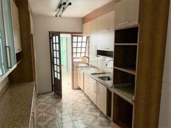 Casa no bairro Jardim Botânico de 3 dormitórios