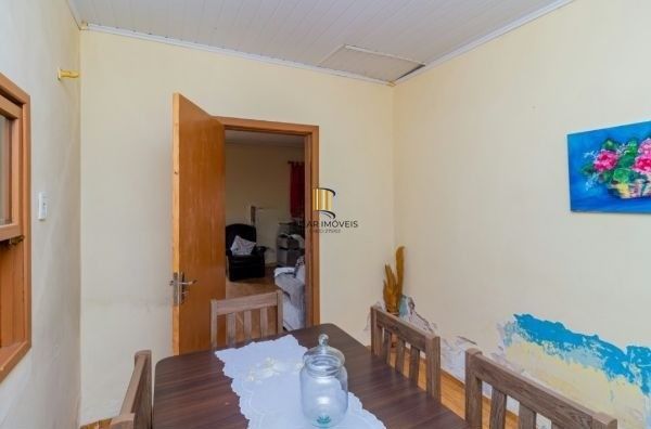 Casa / Terreno com 3 casas de alvenaria no bairro Morro Santana