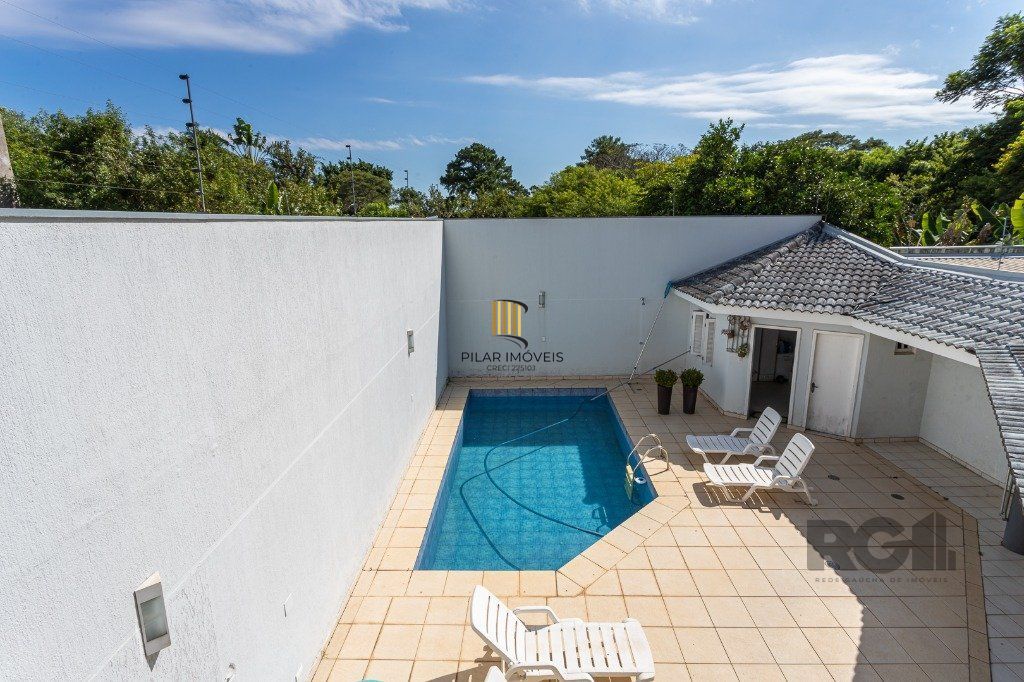 casa sobrado no Alto Petrópolis de 5 dormitórios e 3 vagas