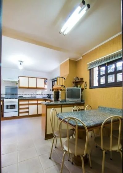 Casa sobrado no Petrópolis com 7 dormitórios e 4 vagas