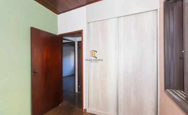 Casa no bairro Jardim Botânico de 4 dormitórios e 3 vagas