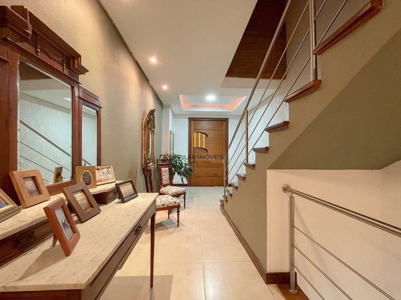 Casa com 4 quartos e 339m² à venda em Santa Tereza, Porto Alegre.