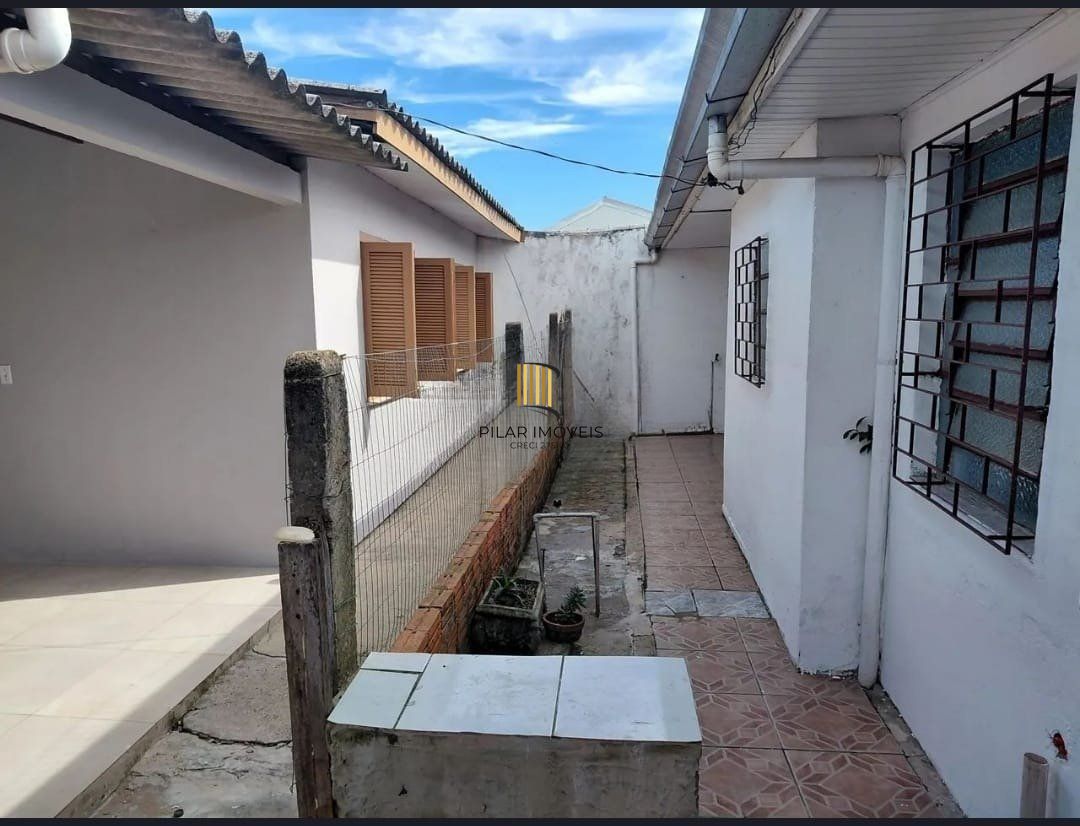 Casa com 3 dormitórios e 2 vagas de garagem em Gravataí.