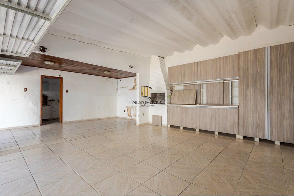 Casa com 4 quartos, 7 vagas e pátio no Bairro Higienópolis