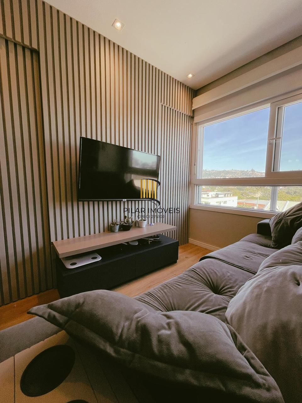 Apartamento com 1 dormitório e 1 vaga de garagem no Bairro Partenon