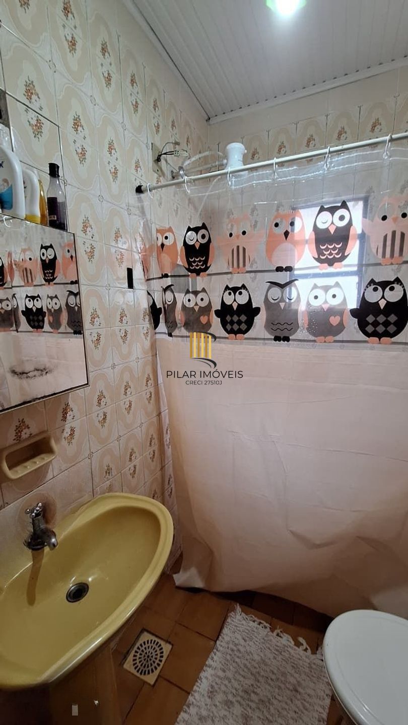 Casa de 4 dormitórios e 4 vagas de garagem em Canoas.