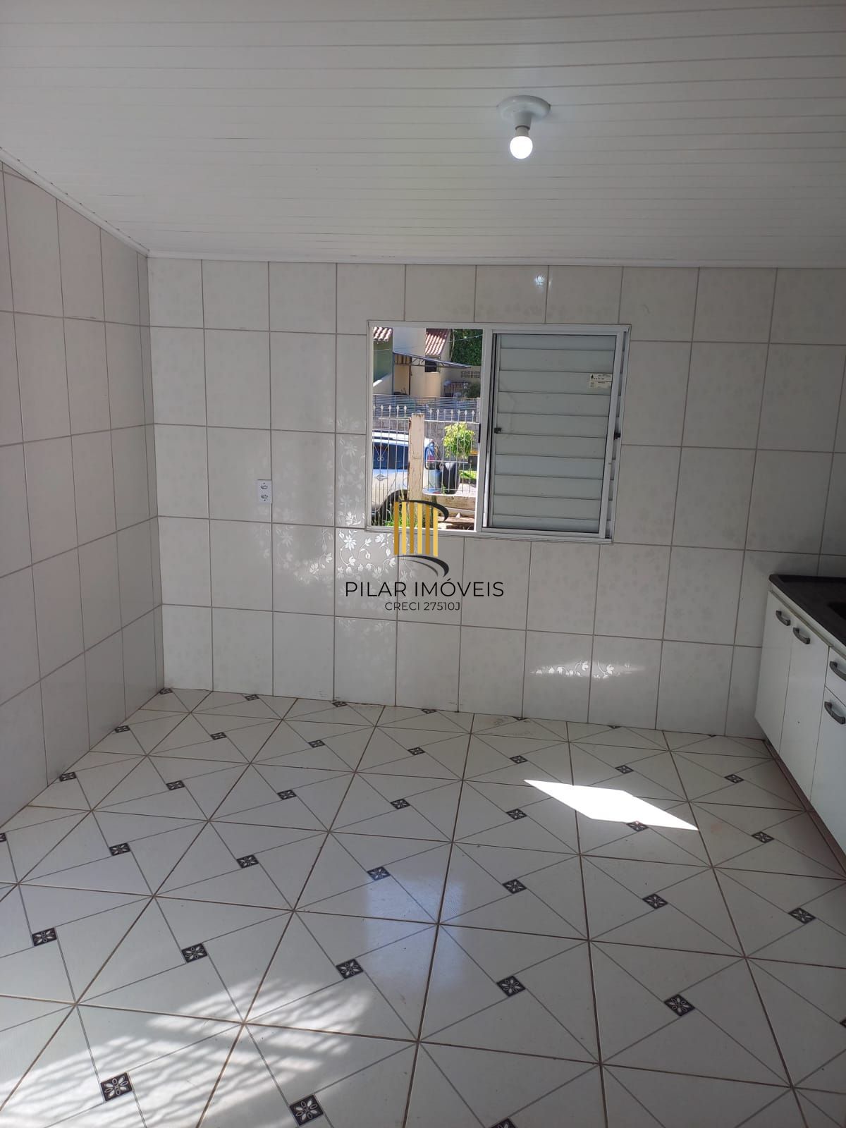 Casa com pátio e edícula no Bairro Porto Verde
