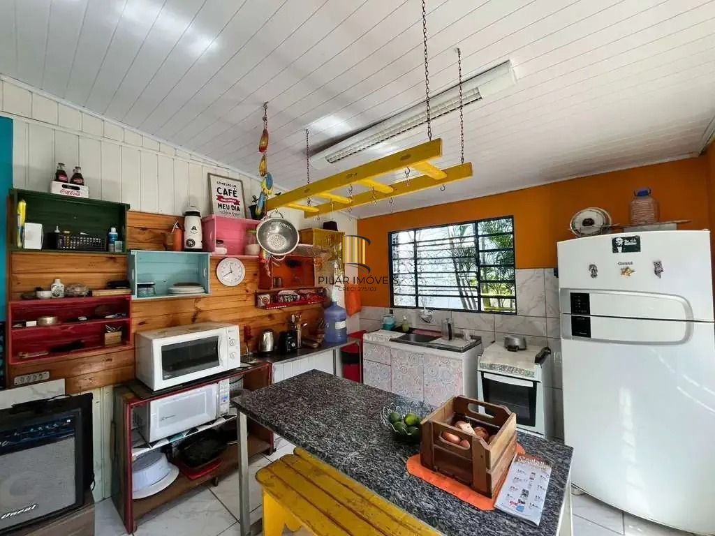 Casa com 3 quartos, vaga coberta e com muro no bairro Campos Novo