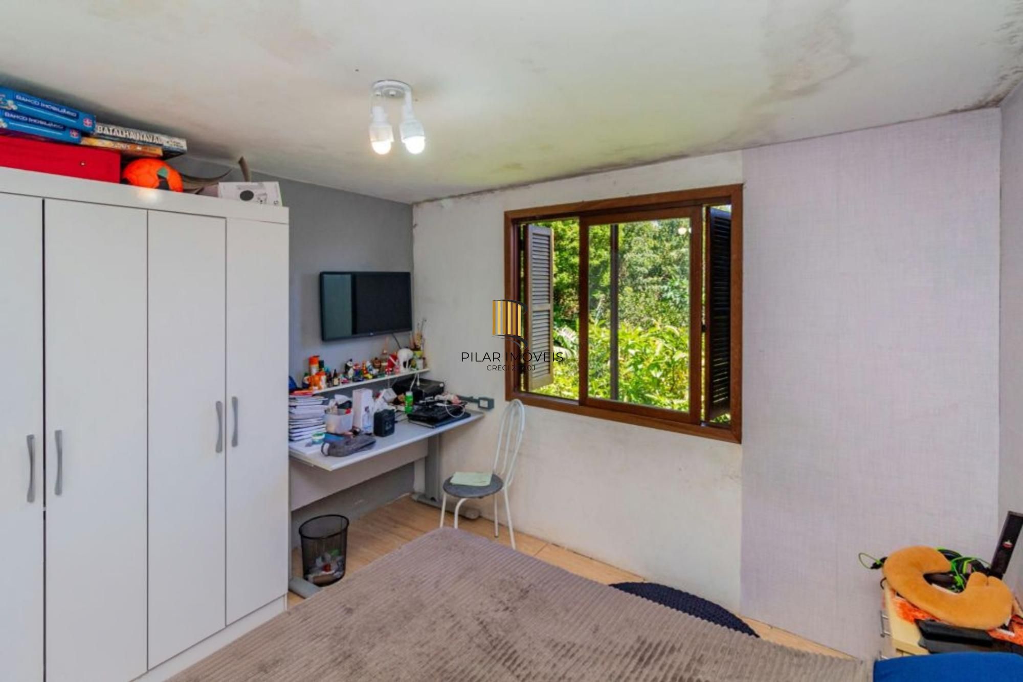 Casa de 3 quartos, 2 vagas no bairro Morro Santana