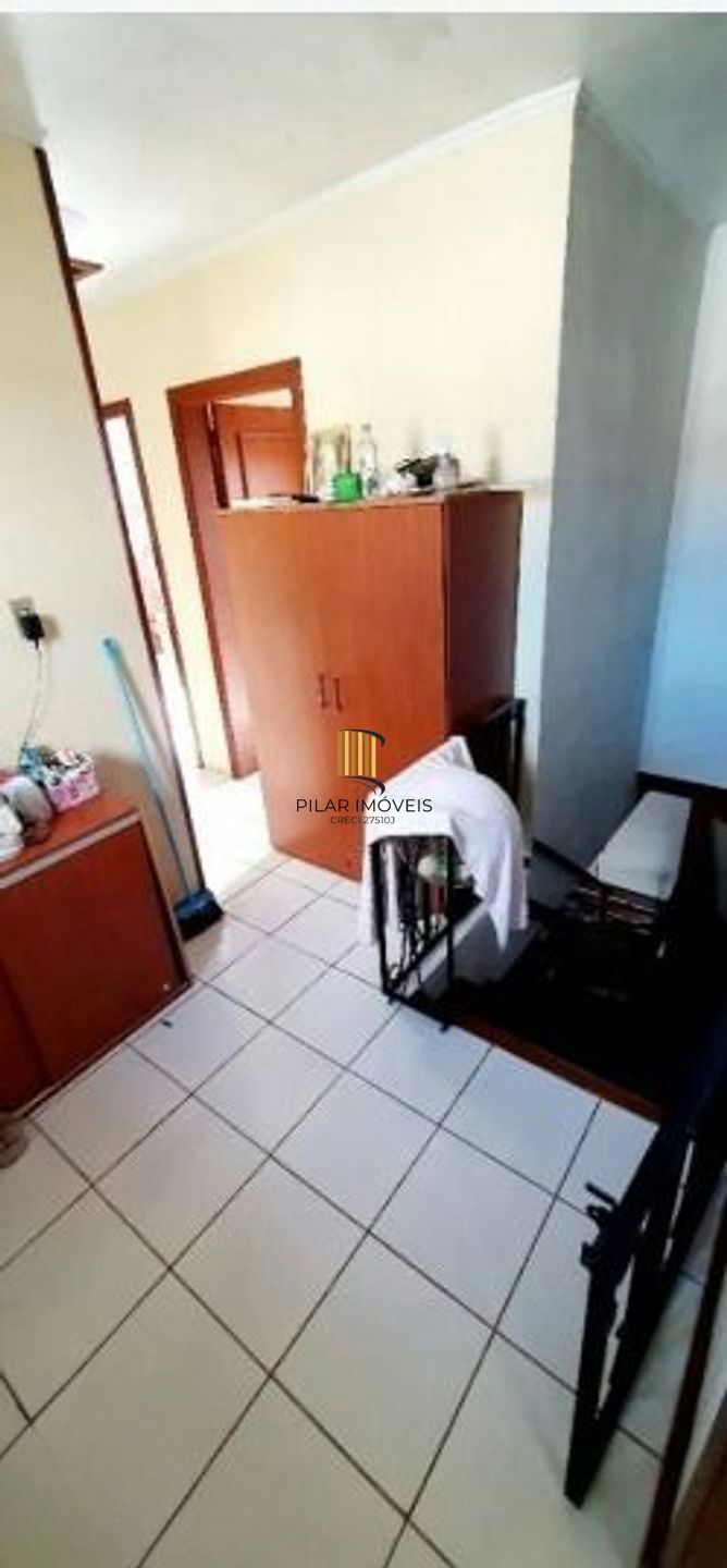 Casa com 5 quartos, piscina e 3 vagas de garagem em Canoas.