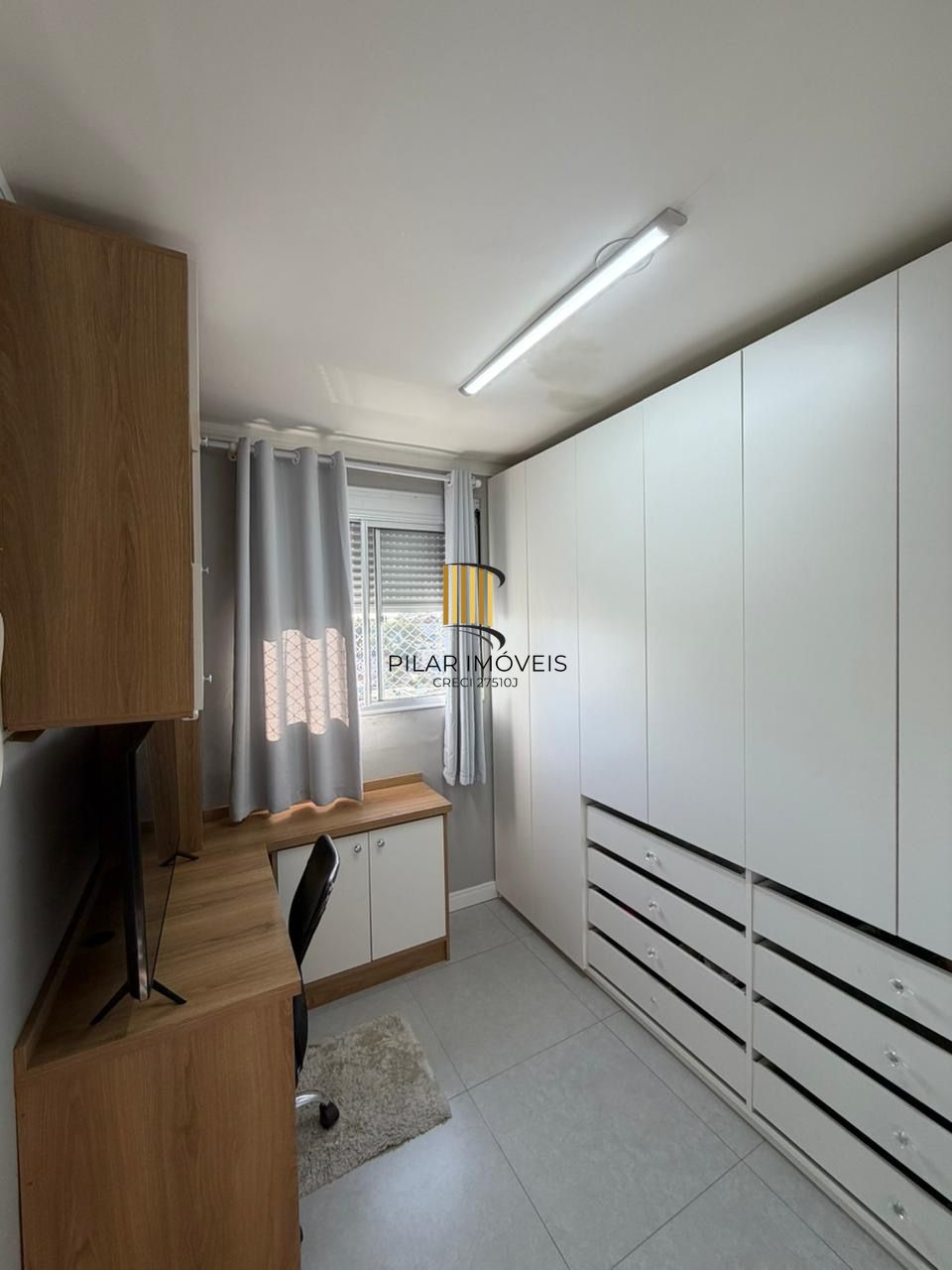 Apartamento com 2 quartos e 1 vaga de garagem no Bairro Sarandí