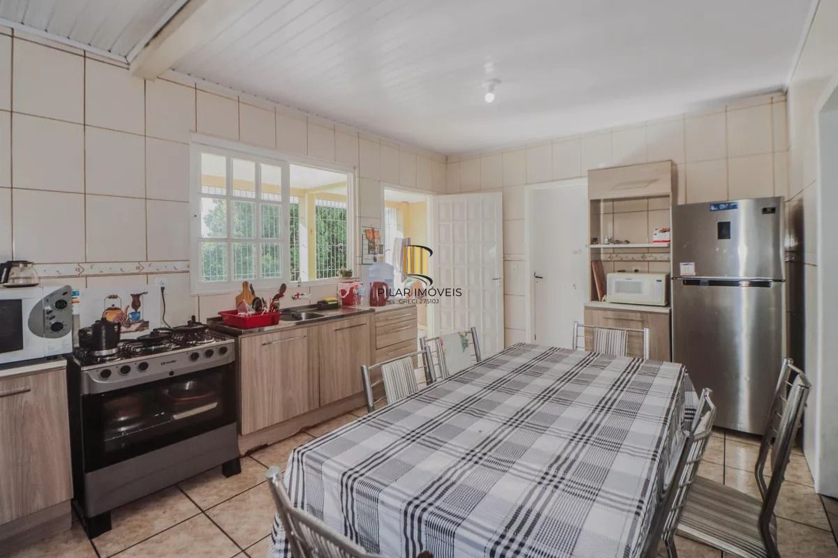 Casa e loja à venda com 300m², 3 quartos e 3 vagas no Rubem Berta