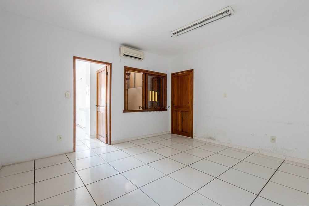 Casa com 4 quartos, 7 vagas e pátio no Bairro Higienópolis