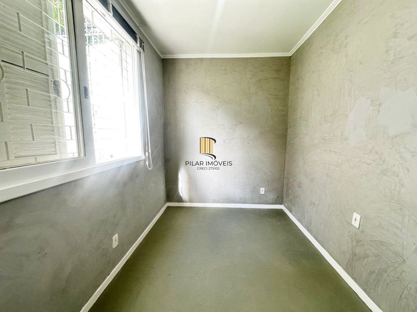 Apartamento térreo com 2 quartos e 1 vaga de garagem no Bairro Auxiliadora