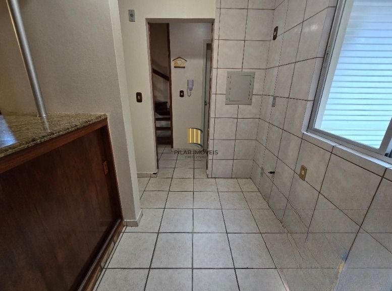 Casa em condomínio fechado de 3 dormitórios,2 vagas no bairro Parque Santa Fé.