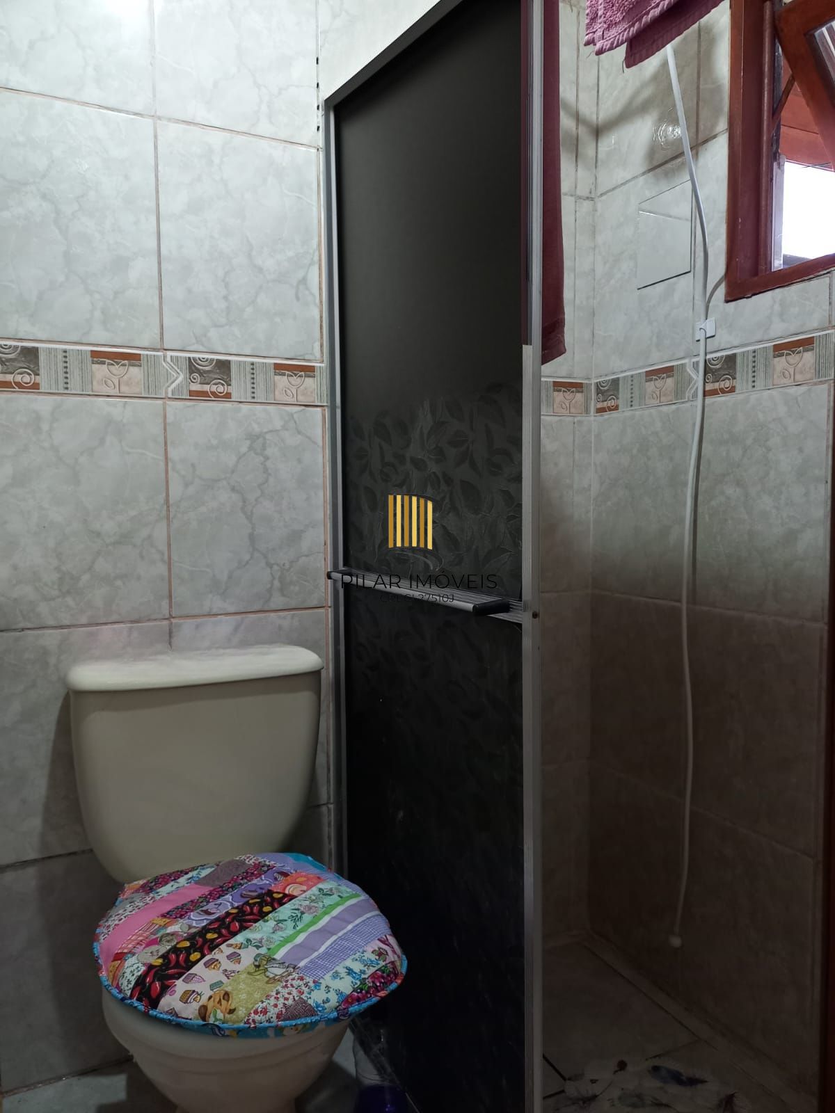 Casa com pátio e edícula no Bairro Porto Verde