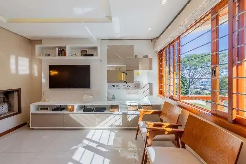 Casa em condominio, 3 domitórios, 1 suíte, lareira, churrasqueira e 2 vagas. - Pilar Imóveis