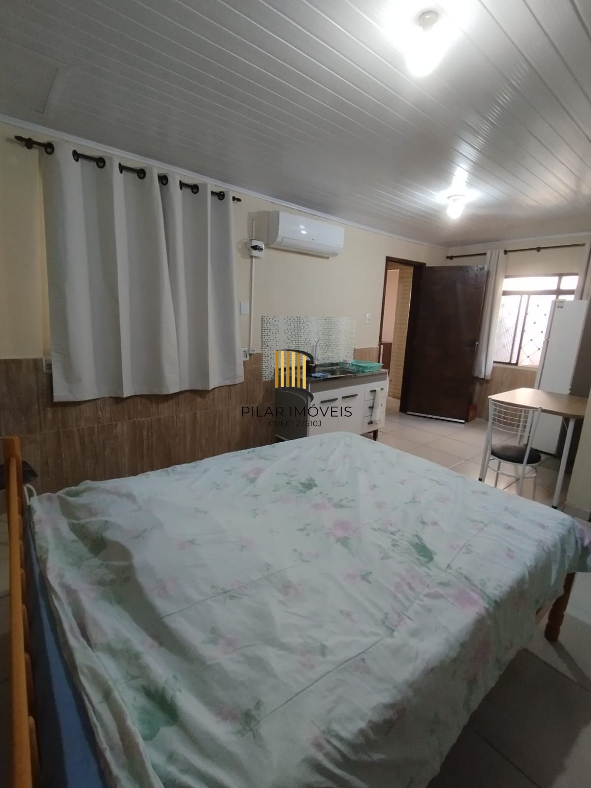 Casa de 4 dormitórios e 2 vagas de garagem em Canoas.