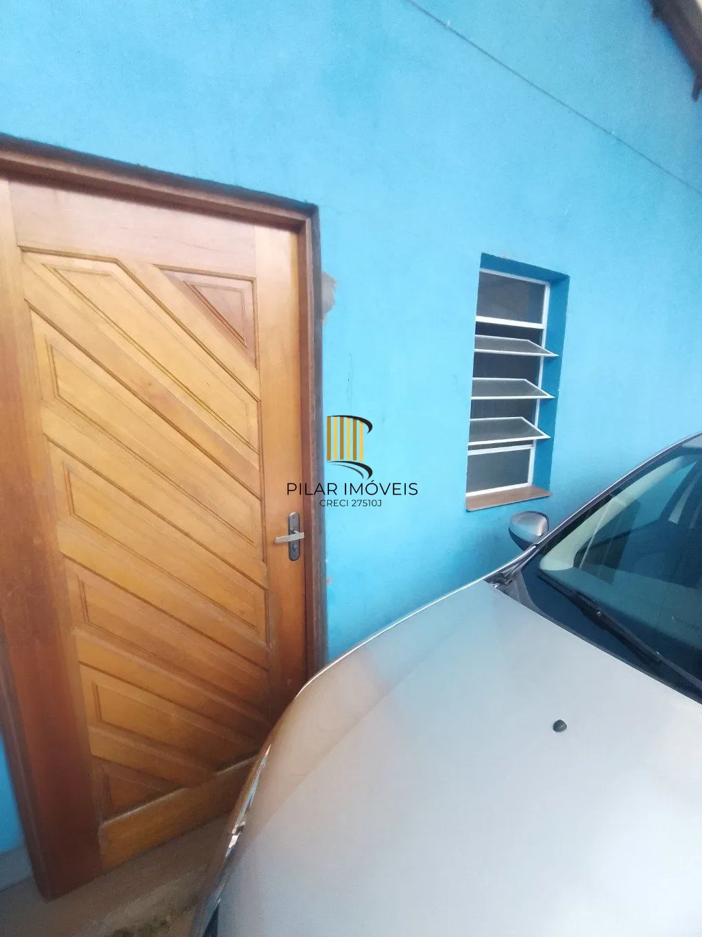Casa de 5 dormitórios, piscina e 4 vagas de garagem em Canoas.
