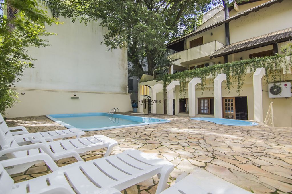 Casa em Condomínio com 5 quartos e 390m² à venda em Boa Vista, Porto Alegre.