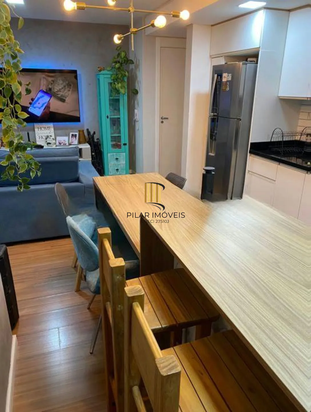 Apartamento de e dormitórios, elevador e 1 vaga de garagem em Canoas.